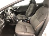 the interior of a car with two seats and a steering wheel