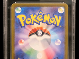 the pokemon card is in a clear plastic holder on a black background