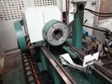 a machine that is working on a piece of metal