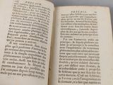 an open book that is sitting on a table