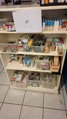 a shelf with various items on it in a store