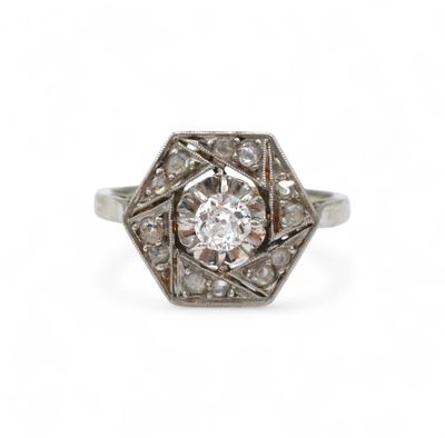 an antique diamond ring set in white gold