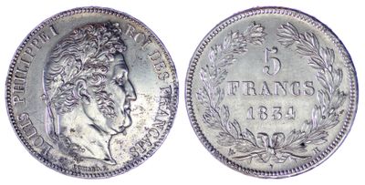 gros plan d'une pièce de monnaie sur fond blanc
