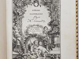 un livre ouvert sur lequel figure un dessin en noir et blanc représentant une femme et un enfant