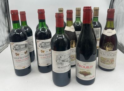 six bottles of wine are lined up in a row on a table