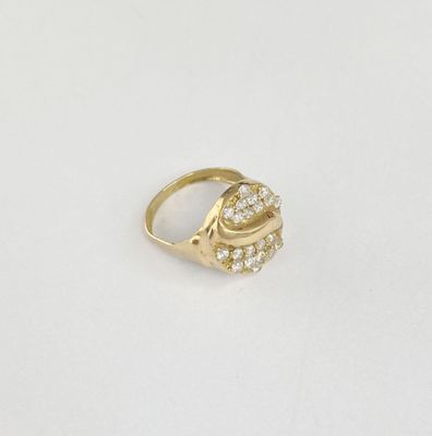 an image of a gold ring with diamonds on a white background
