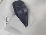 a remote control sitting on top of a piece of paper
