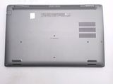 a laptop that is sitting on a white surface