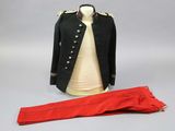 an image of a black jacket and red pants on a mannequin