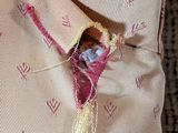 a piece of fabric that has been torn off of a pillow
