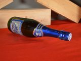 a bottle of wine that is sitting on a table