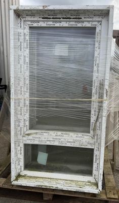 a large window that is sitting on a pallet