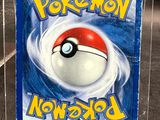 a plastic box that has a pokemon ball inside of it