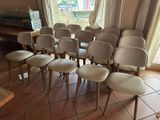 a lot of chairs that are sitting in a room