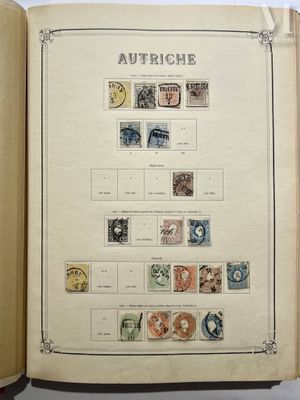 an open book with stamps on it on a table
