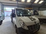 a white van that is parked inside of a building