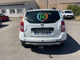 a small white car parked in a parking lot