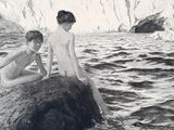 two boys sitting on a rock in the water