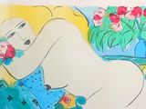 a drawing of a woman laying on a bed