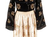 robe noire et dorée sur un mannequin, mannequin, mannequin, mannequin, mannequin, mannequin, mannequin, mannequin, manne