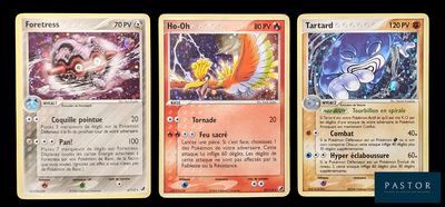three cards with different designs are shown on a black background