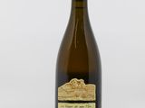 a bottle of wine that is sitting on a table