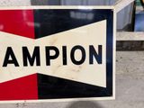 a sign that says champion on it in front of a building