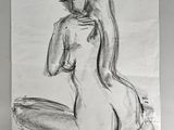 dessin représentant une femme assise par terre, les jambes croisées