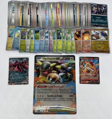 beaucoup de cartes pokemon différentes sur la table