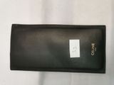 a close up of a black wallet with a tag on it