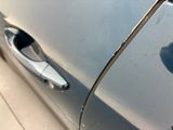 a close up of a car ' s door handle and door handle