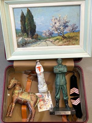 a picture of a picture of a man and a horse in a suitcase