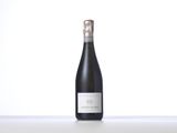 the bottle of wine is sitting on the table with a white background