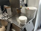 an image of a kitchen with a mixer and bowls on the counter