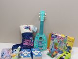 a lot of toys and a guitar on the table