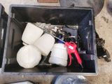 a container with a bunch of items inside of it