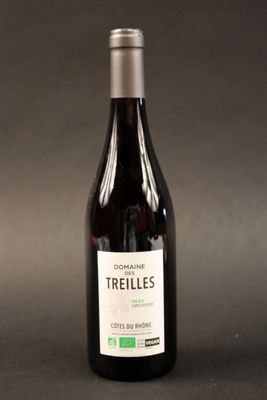 a bottle of wine that is sitting on a table