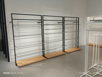 a room with a bunch of shelves that are on the wall