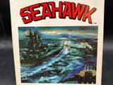 an old game box with a picture of a ship on it
