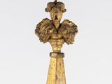 an image of a statue of a woman with a cross on top of it
