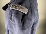 a close up of a uniform on a mannequin