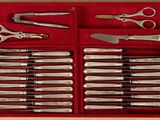 a red box with a bunch of different tools in it