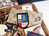 a wooden tray with a variety of items on it