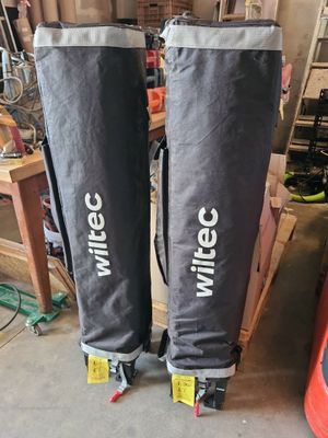 pair of skis sitting on top of a wooden table in a garage