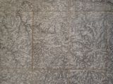 a black and white photo of a bathroom with a tile floor