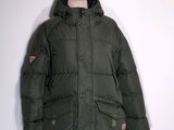 an image of a green parka with a hood on a mannequin stand