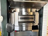 an image of a commercial pizza oven in a kitchen