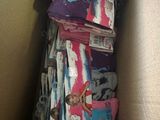 a box full of socks that are stacked on top of each other
