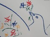 a drawing of a bird and flowers on the wall