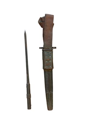 a knife and a knife holder sitting next to each other